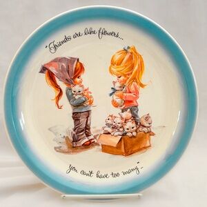 Sweet 1970s sentimental illustration featuring girls and kittens